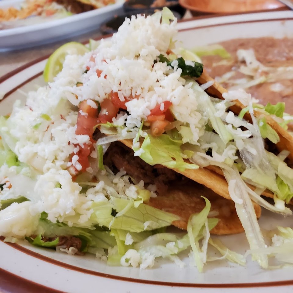 Seafood and taco menu pages.